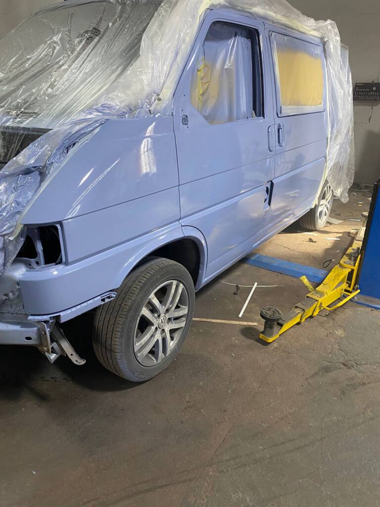 VW T4 full respray in spray booth after basecoat and lacquer application